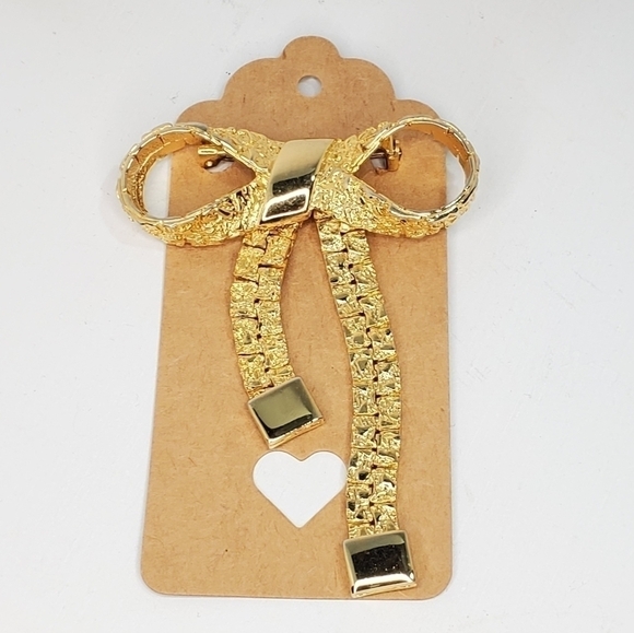 Vintage Goldtone Gold nugget Articulated Bow Brooch - Picture 1 of 7